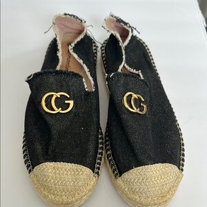 Chic Black Moccasins with Gold Accents